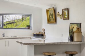 Kitchen view 2: Even the kitchen is character filled!