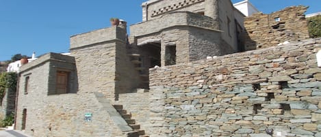 The Cyclades Olive Museum;s building with the Guest House (GH)