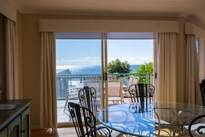 inside dining area looking out to balcony dining area