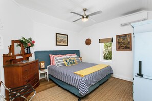 Bedroom, with aircon, ceiling fans, can be set up as a king or two single beds
