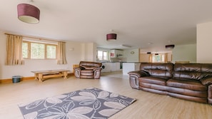 Open Plan lounge, kitchen, dining.