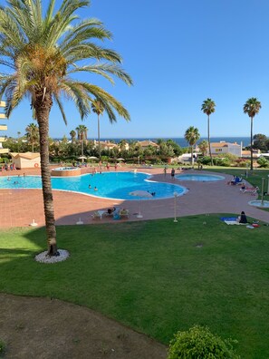 View of pool area from balcony