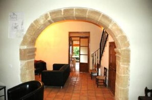 Living room from the front door - looking through to kitchen and garden