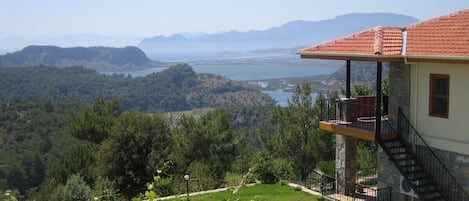 Cicek Evi and the view over the lake to the beach