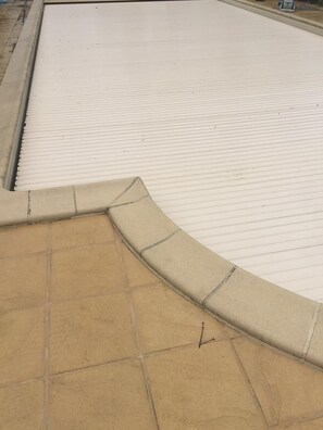 Swimming pool electric cover in place