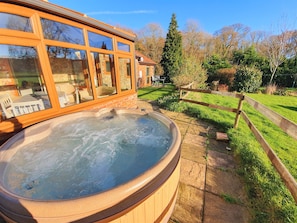 Conservatory and Private Hot Tub.