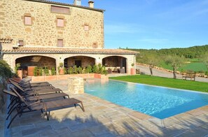 The pool and terrace area is perfect for a family