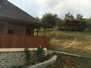 House with veranda and higher up the deck