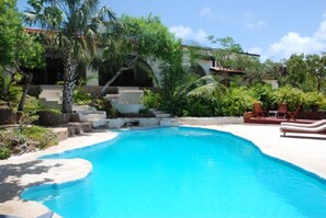 View across pool to separate guest wing