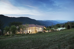 house and pool at night