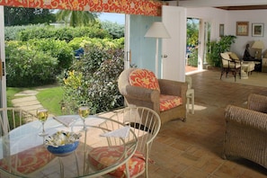 Breezeway opening to  living room and garden