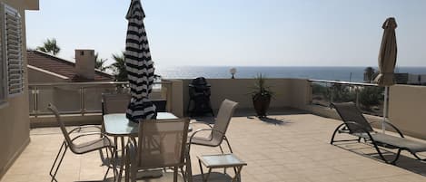 View! spacious Balcony, Patio Table, Chairs, Sunbeds, Umbrella, Shower