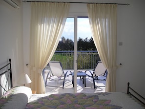 Master bedroom with en-suite and roof terrace overlooking the pool