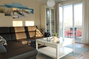 Living room with access to the south-east balcony