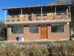 The house newly completed. First floor 2 bedrooms and a kitchen in the middle.