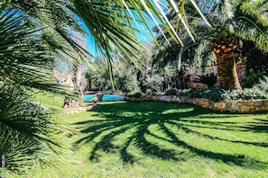 View of the pool from the garden