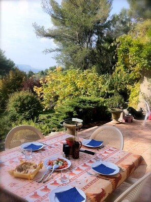 A table with a view... Meals on the terrace.