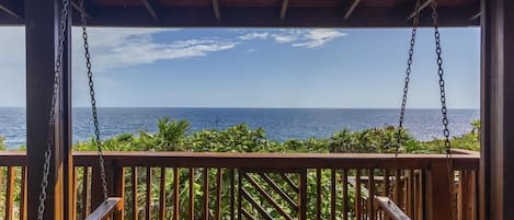 Relax and enjoy the 180° Caribbean view.