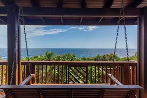 Relax and enjoy the 180 Caribbean view.