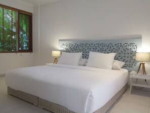 G/F bedroom with king size bed, smart TV, ensuite indoor-outdoor bathroom