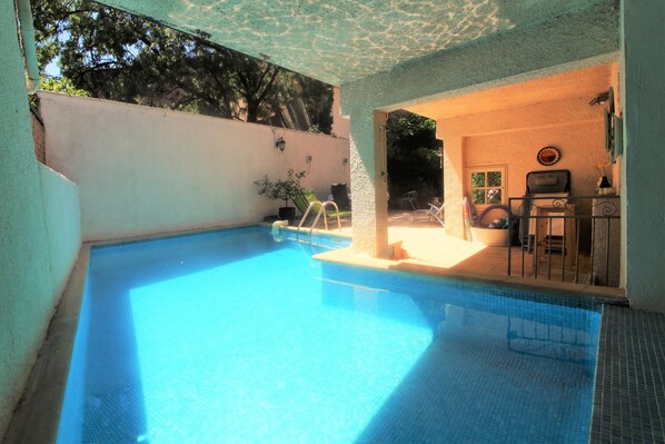 Pool and entrance from inside the gite.