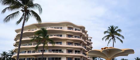 Pool partial view and Condominium building