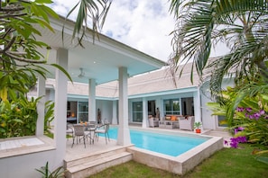 Topical Gardens surround private Pool