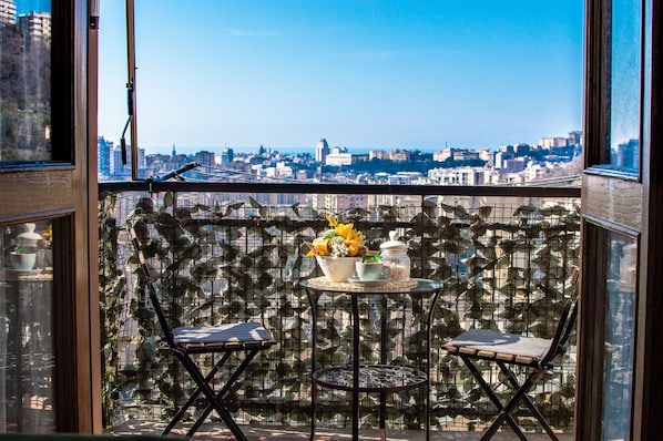 Enjoy breakfast on your panoramic balcony