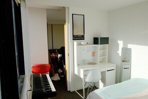 Bedroom has a desk