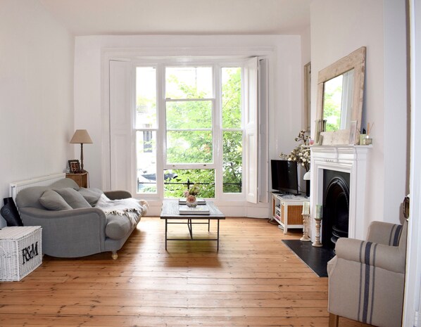 Living area (with double wooden doors to master bedroom)