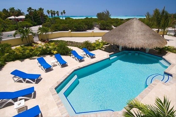 View of pool from 3 floor crow's nest, showing path to beach