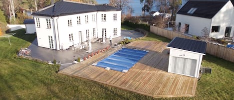 The Pool area has a new decking and pool house
