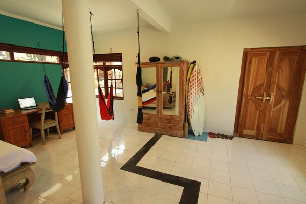 Desk, Hammocks, and TRX anchor point.  Plenty of space for 2 yogis to practice.