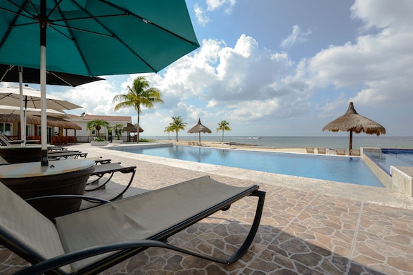 Guests of Casa Catarina get relax poolside and enjoy the spectacular ocean views