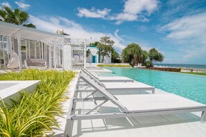 Pool loungers with unobstructed sea views!