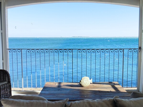 Sliding windows open to turn the sitting room into a spectacular indoor terrace