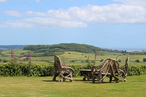 Views from the front lawn with traditional seating.
