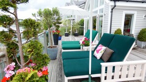 Two double sunloungers with uninterrupted views of Summer Lake