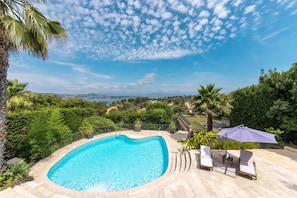 View of the pool with Baie des Anges in the background