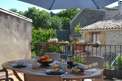 Enjoy a leisurely breakfast of croissants on the large private terrace.