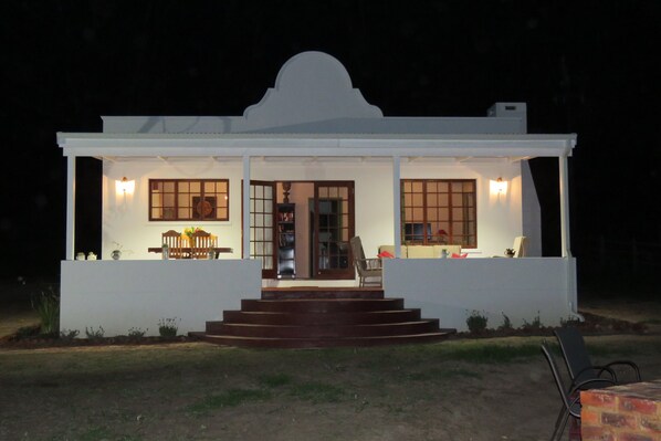 Cottage entrance at night