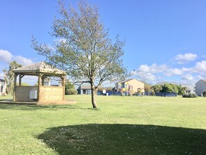 Lovely feeling of space here with lots of gardens and grounds ...  play area etc