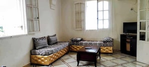 Coin salon avec climatisation (2 couchages)