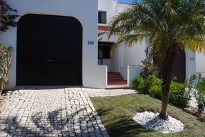 Front of house, driveway and entrance to front porch