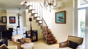 View of the stairs accessing the roof terrace from the living room