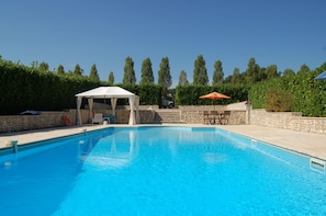 The large pool and spacious terrace get the sun all day