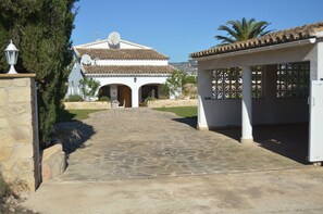 Front of Villa Driveway and Carport