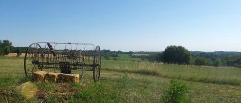 View across the farmland and valley towards foothills of Pyrenees
