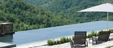 Infinity Pool overlooking the Umbrian hills