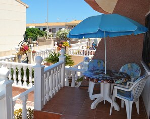 a part of the downstairs terrace